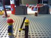 A LEGO GUY GETTING BEAT UP